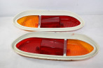 PAIRE DE CABOCHONS DE FEUX AR D/G SEIMA 616..PEUGEOT 204 BERLINE 1965/67